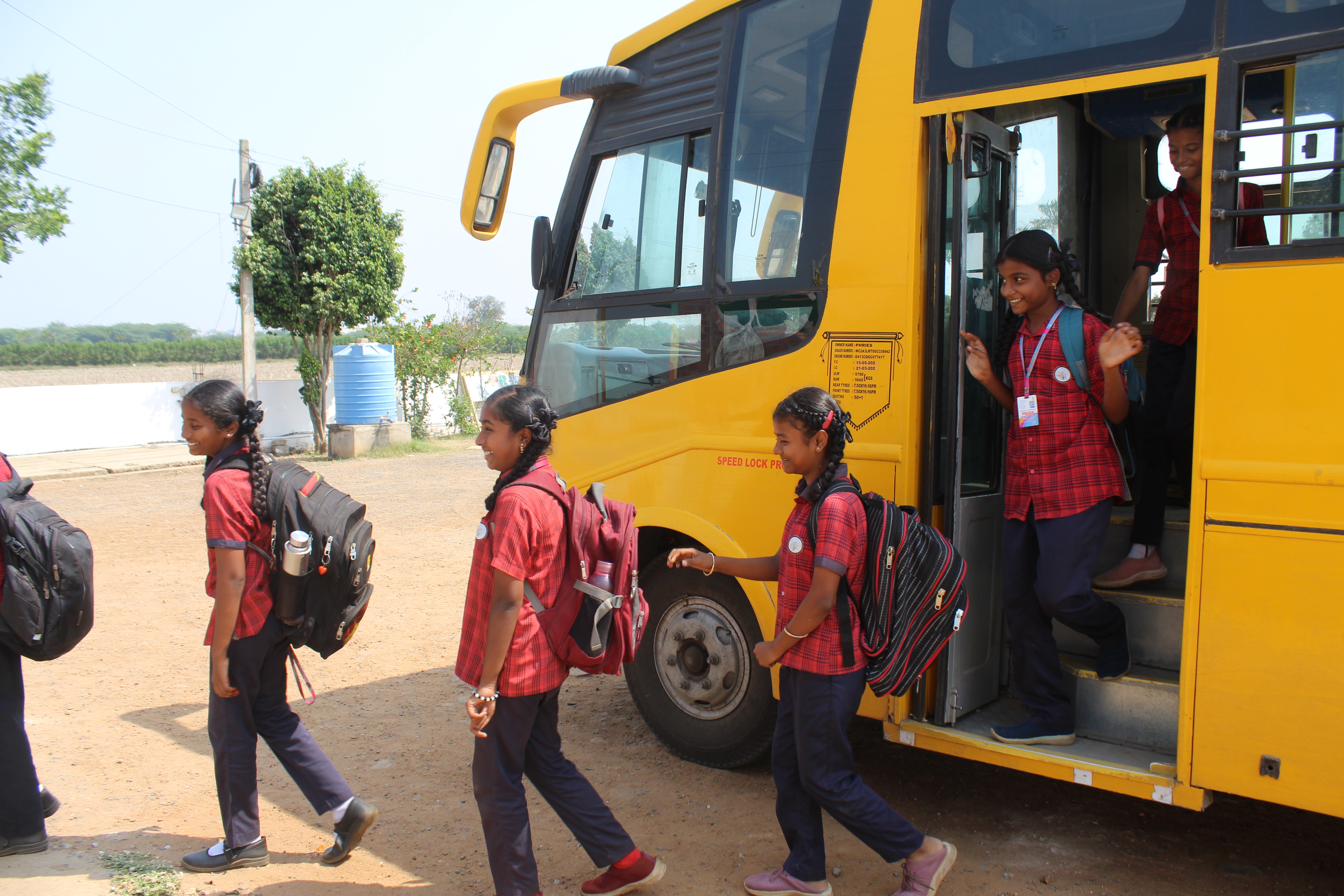 Pride International School transport buses and vans